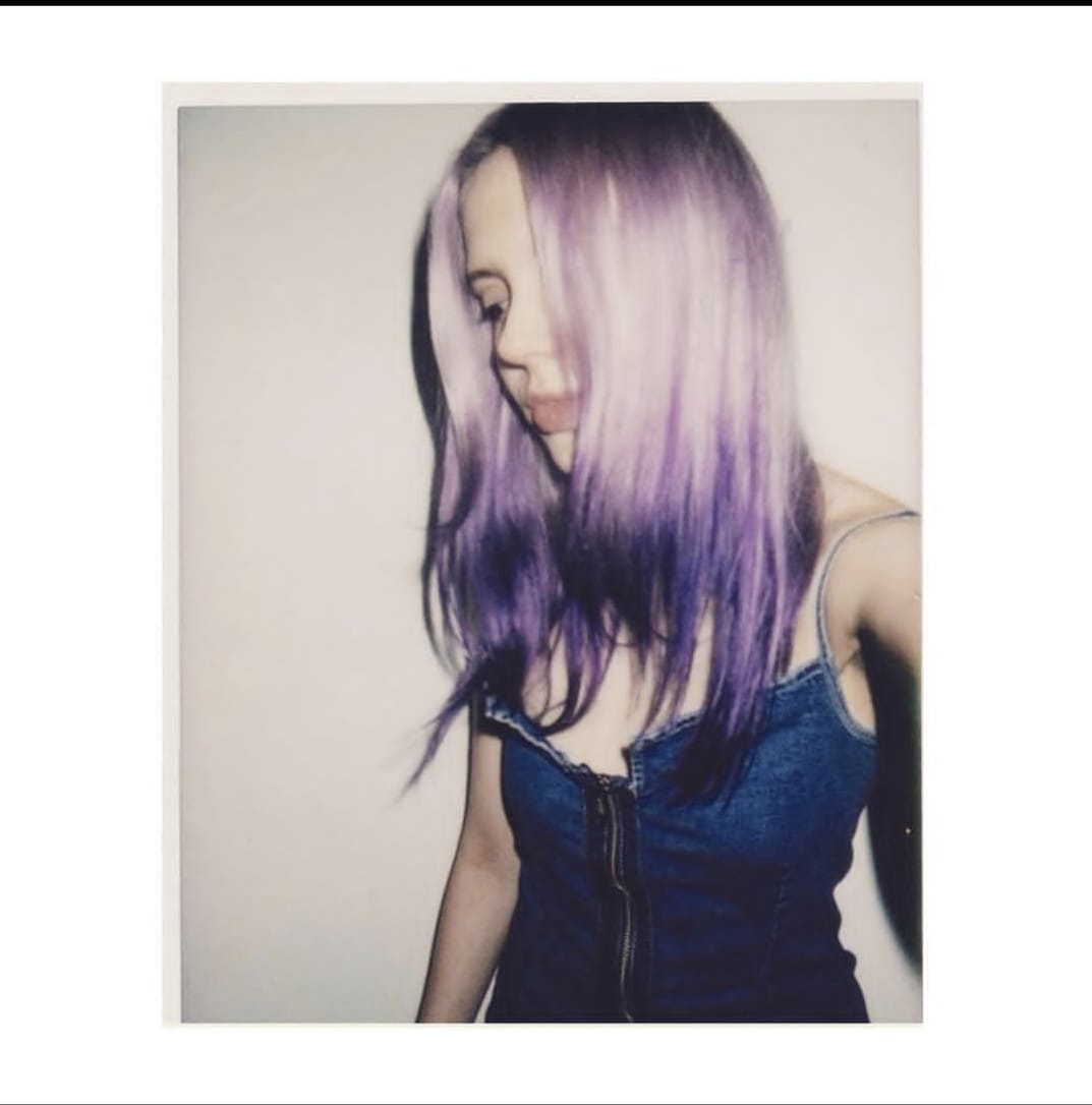 woman with long purple dyed hair